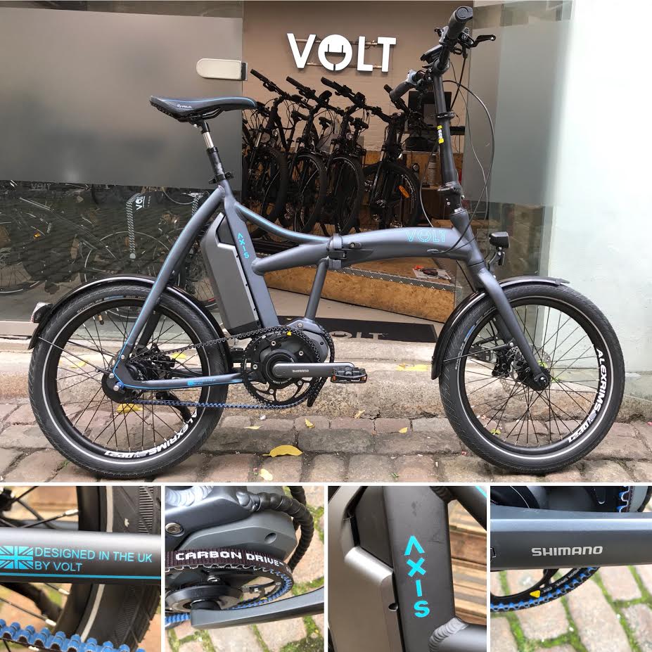 The VOLT Axis folding e-bike parked outside the VOLT showroom