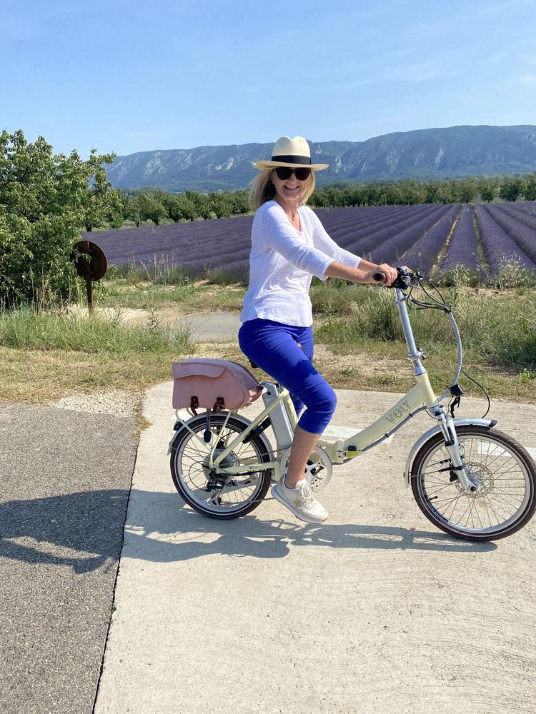Penny enjoying cycling through the lavender fields of Provence, France.